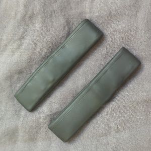 2 black Pony-O hair ties